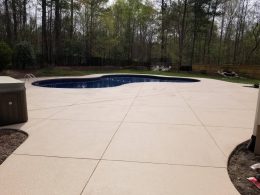 Pool patio with overlay and diamond joints